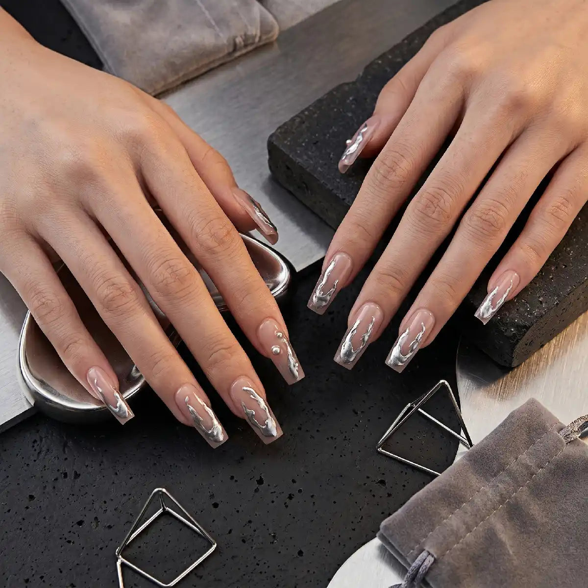 Kentrim Nude with Silver Liquid Metal press-on nails, 30-piece set in 15 sizes, featuring sleek, metallic nail designs. Main image