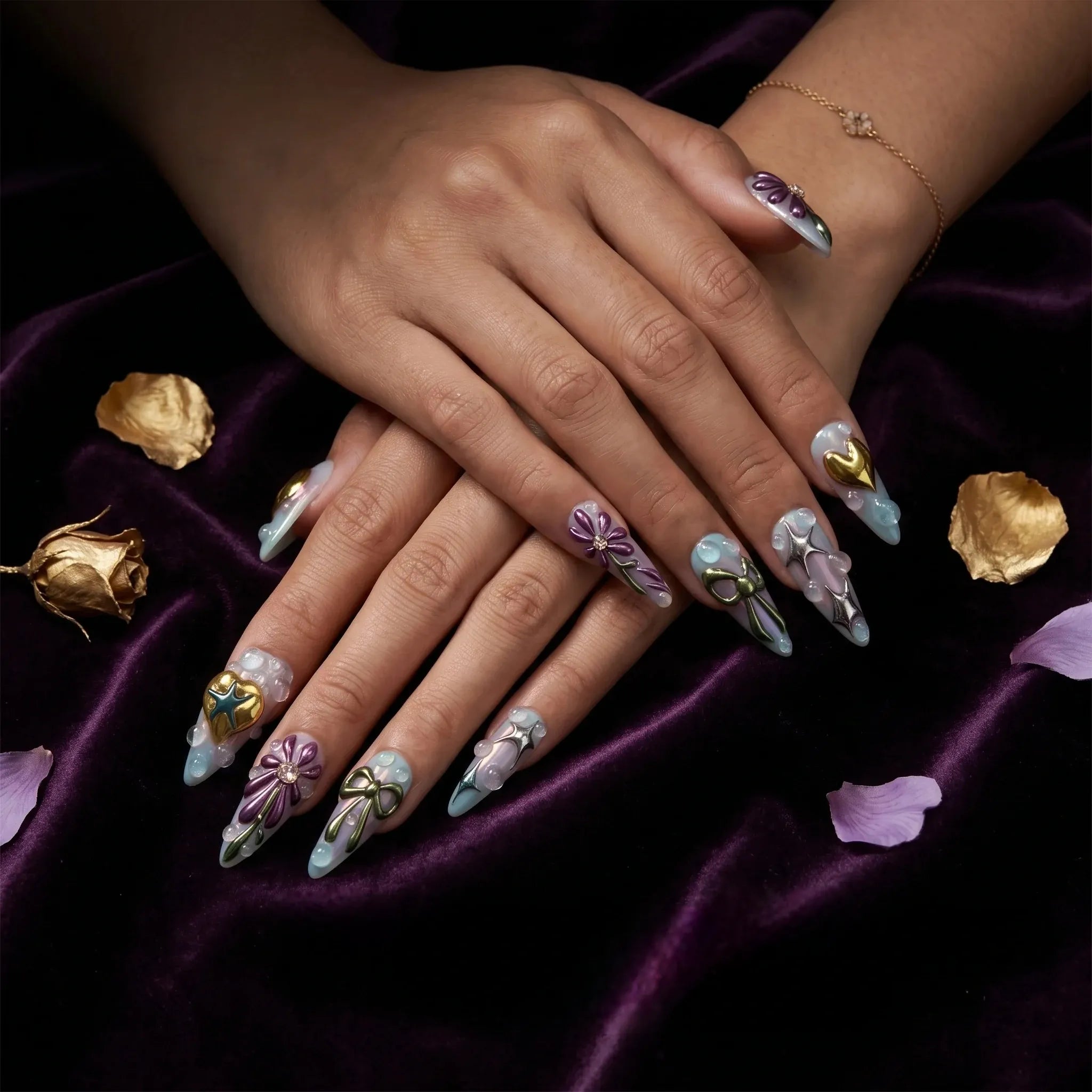 Kentrim Floral Fantasy press on nails with stiletto shape, purple flowers, gold heart bow accents, iridescent pastel finish, reusable. Main image
