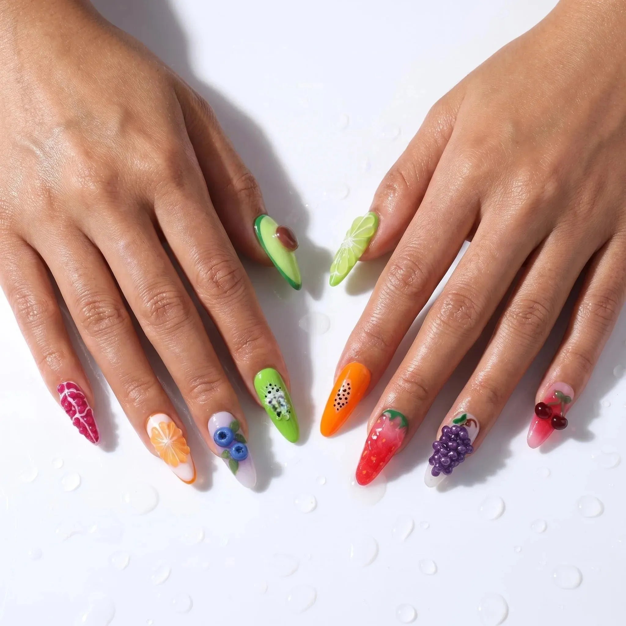 Kentrim Fruit Fiesta press on nails featuring almond shape with 3D avocado, strawberry, and cherry accents, reusable false nails for women. Main image