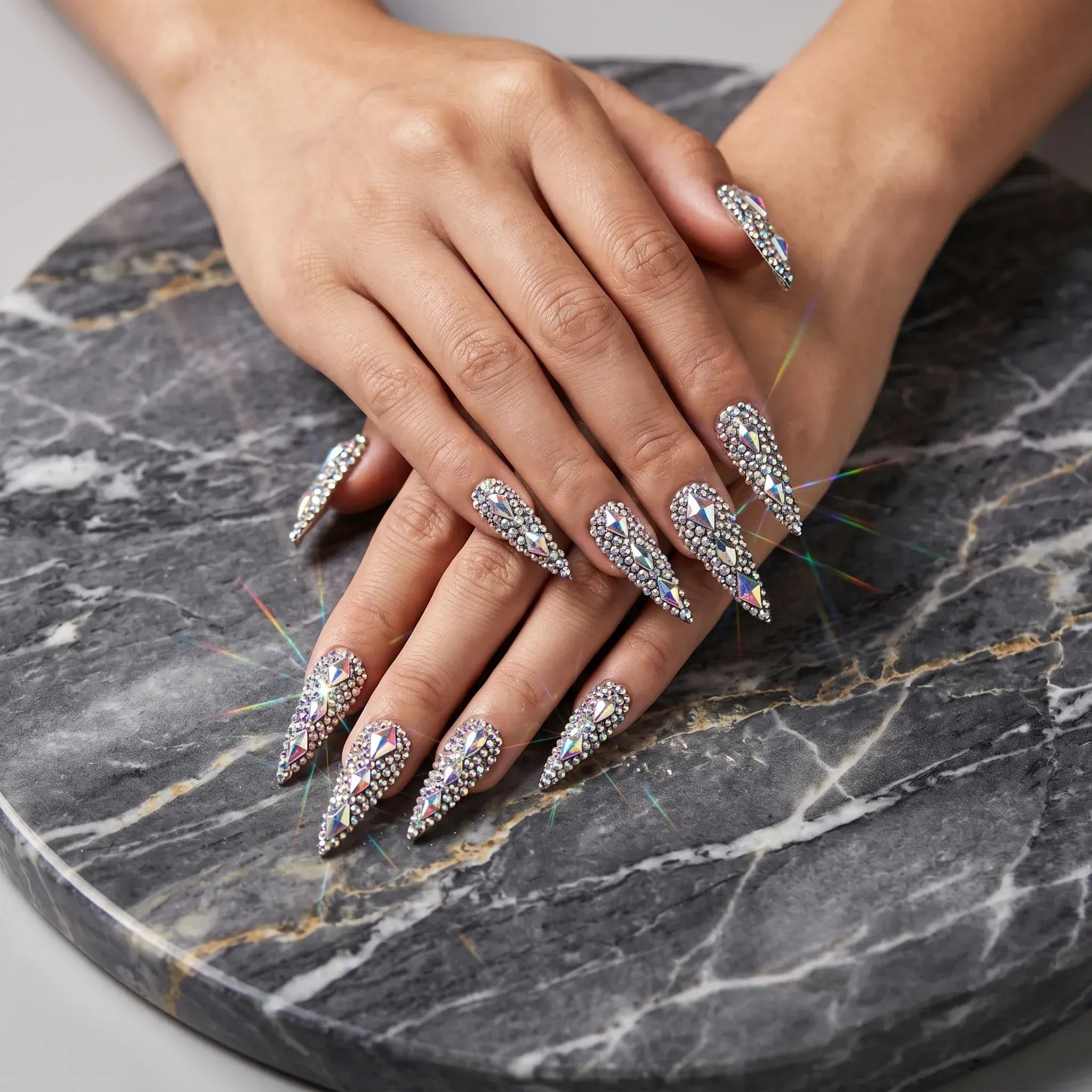 Kentrim Crystal long stiletto press on nails with multicolor rhinestone accents, 10-piece set, reusable false nails. Main image