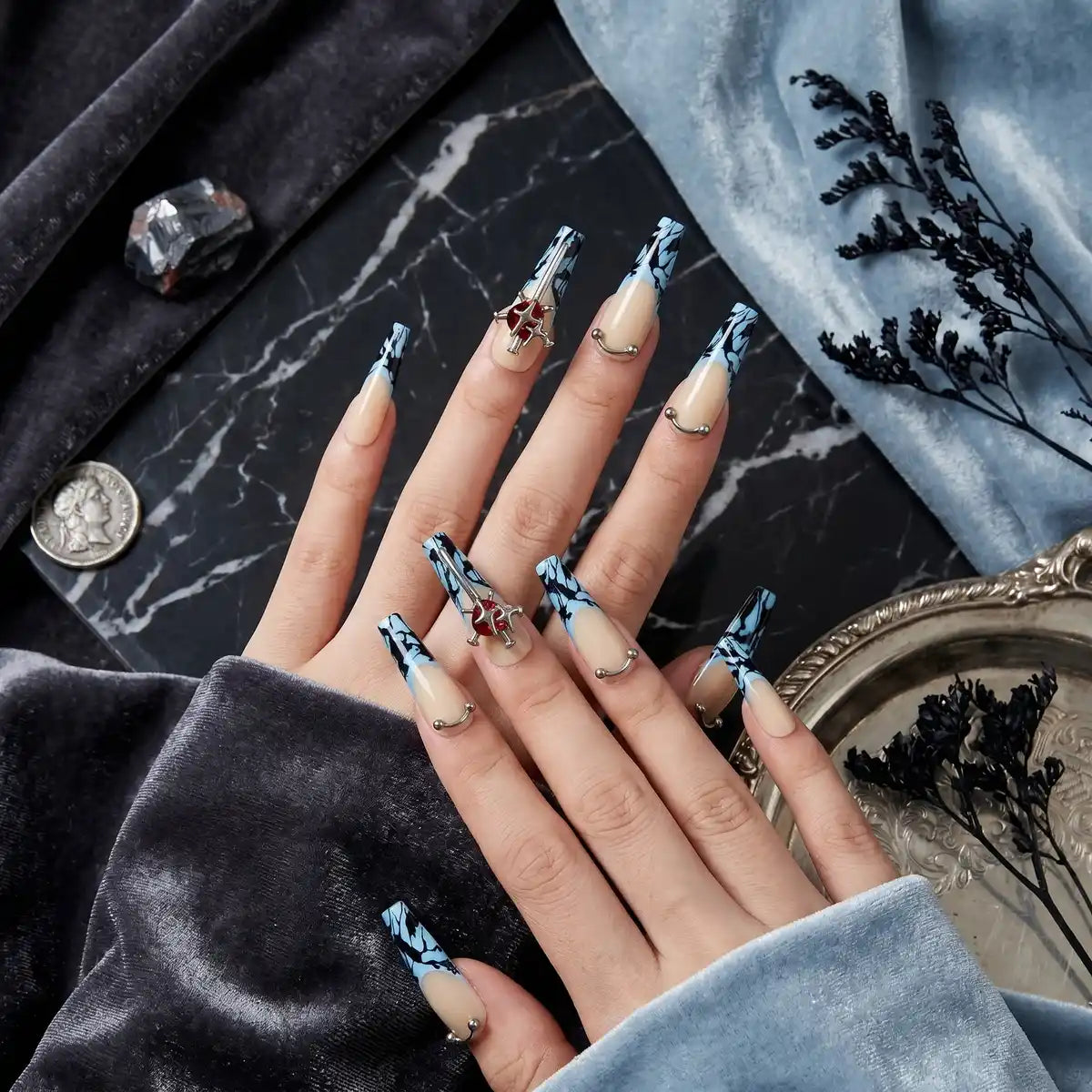 Kentrim blue marble sword cross coffin press-on nails, 30-piece set with 15 sizes, showcasing long coffin shape and intricate design. Main image