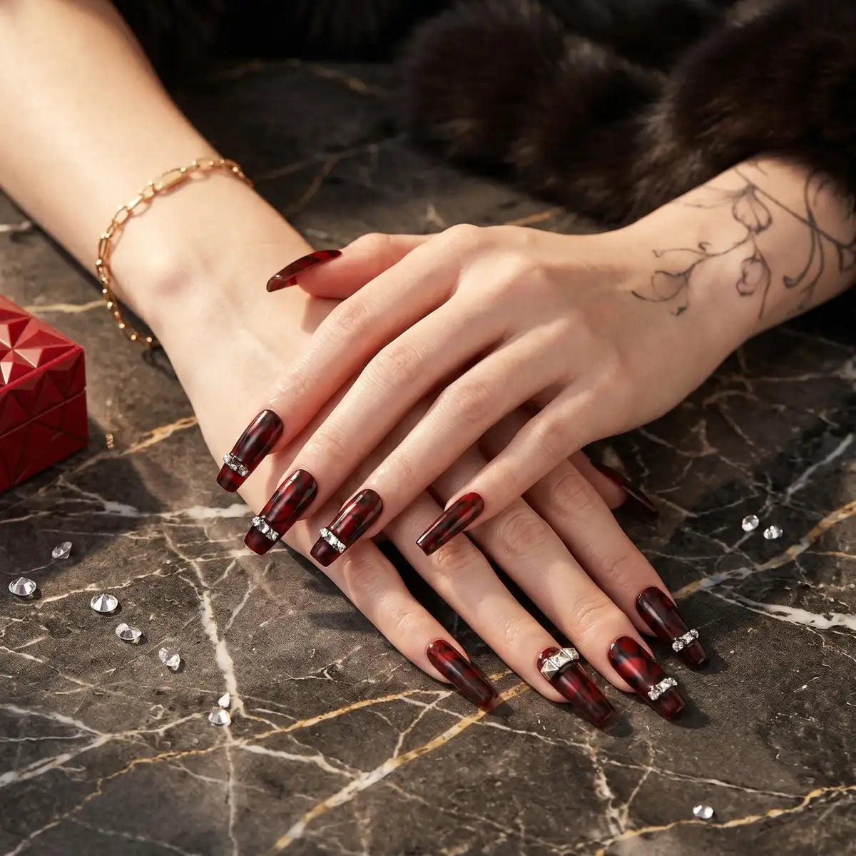 Kentrim Burgundy Smudge Rhinestone long coffin press-on nails with 30 pieces in 15 sizes, featuring elegant rhinestone details. Main image