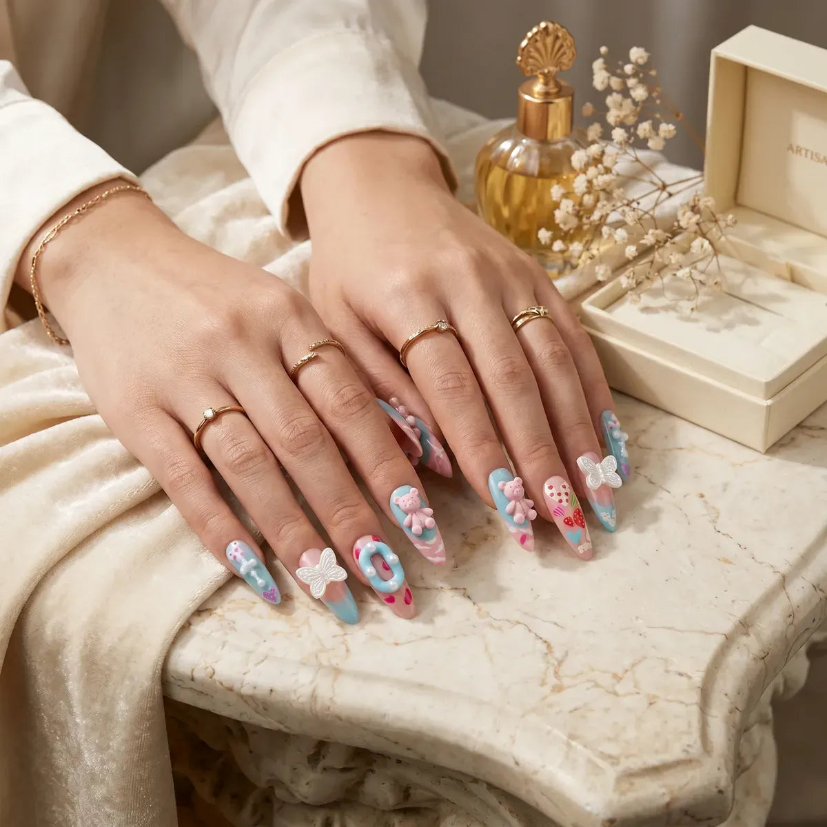 Kentrim press-on nails set with macaron, bear, butterfly, heart, almond shapes in 15 sizes, 30-piece nail art kit. Main image