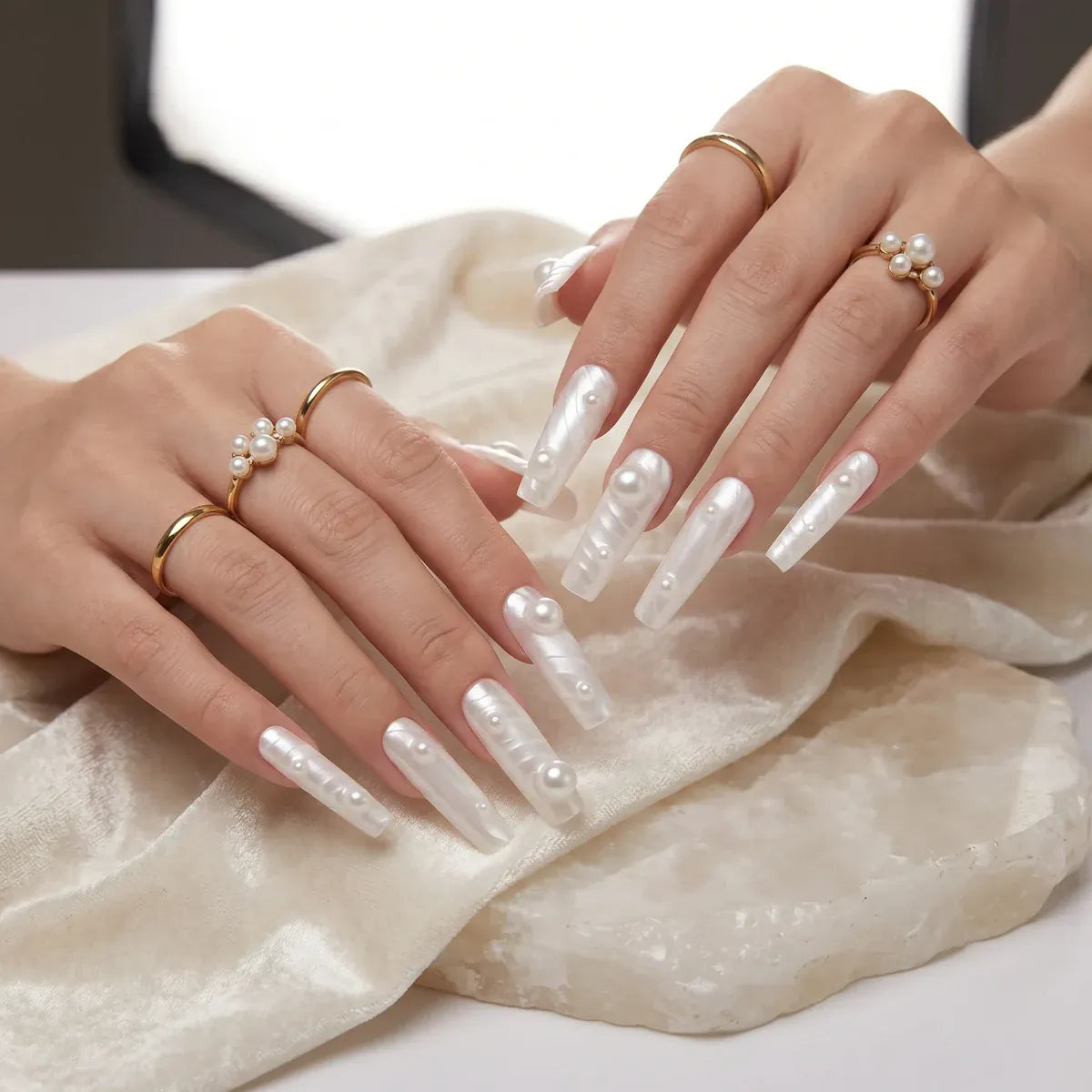 Kentrim white silk textured pearl long coffin press-on nails, 30 pieces with 15 sizes, arranged on a white background. Main image