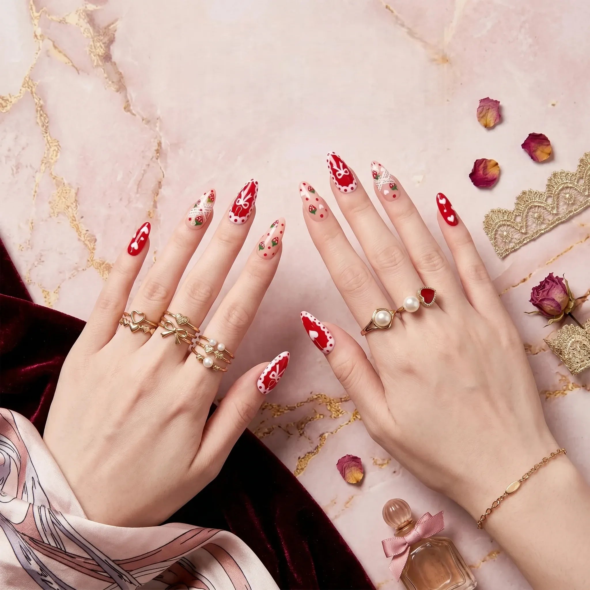Kentrim Sweet Strawberry Delight medium almond press-on nails with red nude bases, hand-painted strawberries, lace bow accents, 10 pieces Main image