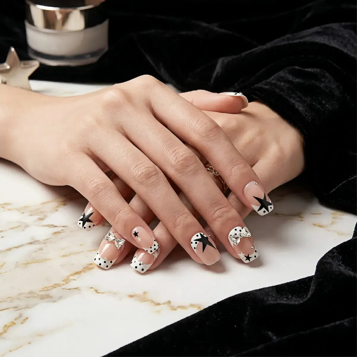 Kentrim polka dot star and bow French press-on nails set with 30 pieces in 15 sizes, featuring decorative nail tips and designs. Main image